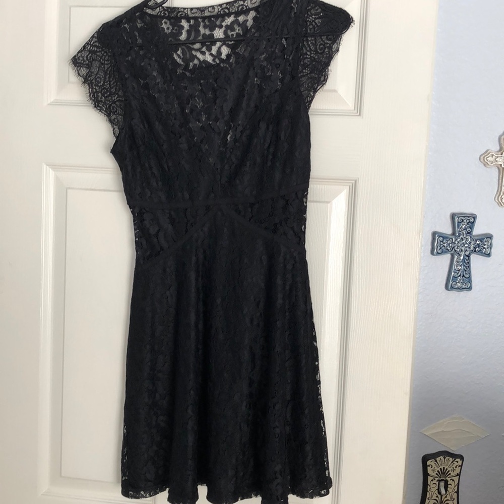 Little black dress with eyelash lace overlay.
